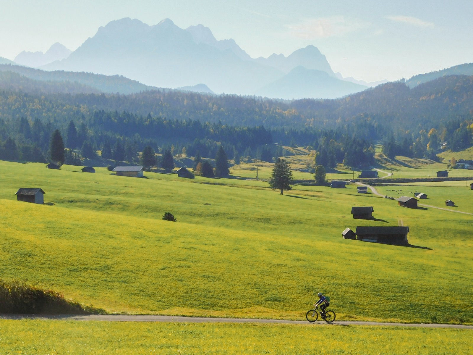 Cyclists in alpine landscape