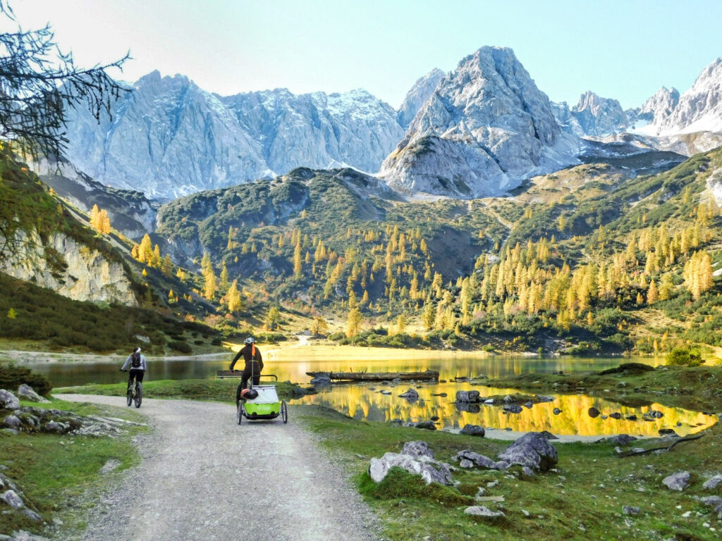 Cyclists with children at Seebensee lake